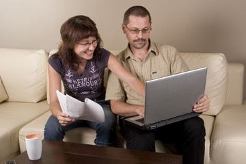 couple with notebook