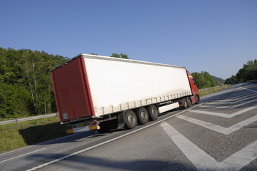 truck speeding past on freeway