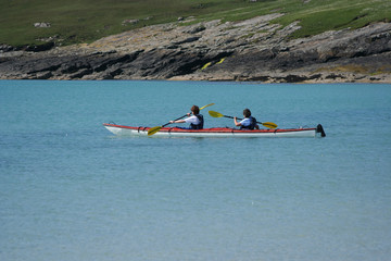 two women kayaking