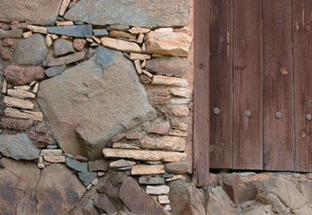 Stone wall and wooden door