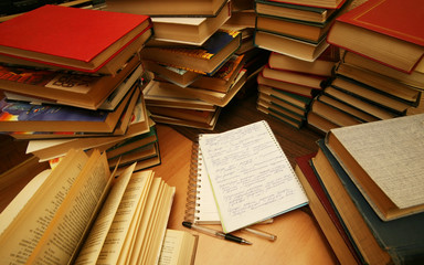 Many old books combined by a heap