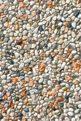A pebble rock background of various types of rocks