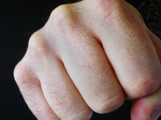 Man's Fist Punching