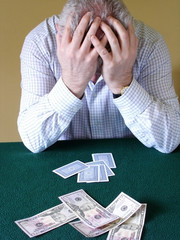 Card Player with Head Held in Hands