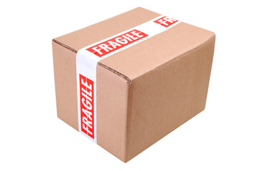 Cardboard box secured with fragile tape ready for despatch