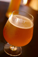 Cold glasses of beer, closeup in traditional glasses
