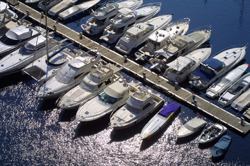 Collection of luxury boats moored in Monaco marina. - Powered by Adobe