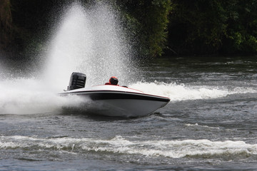 Fototapeta premium A speed boat on the river