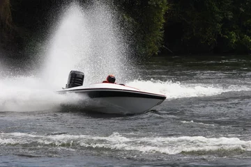  A speed boat on the river © NickR