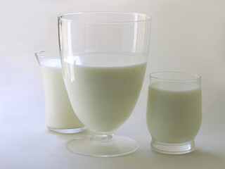 white milk in some glasses