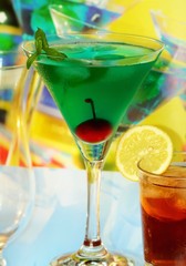 Summer alcoholic recreational drink with cherry and lemon