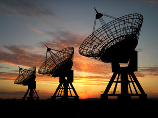 Three satelite dishes over sunset - 3603026