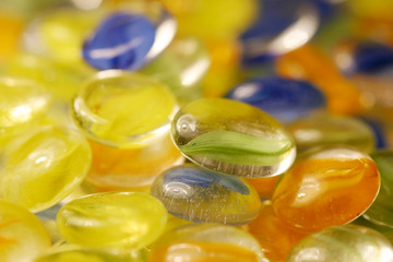 Glass nuggets in green, yellow, orange and blue