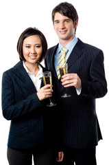 Young Businessman and woman celebrating