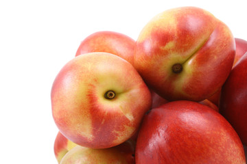 pile of fresh and delicious nectarines isolated on white