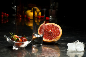 Cocktail glass with ingredients for cocktail