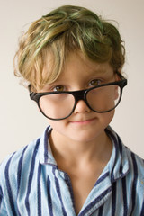 Fototapeta premium Young male boy hanging around in his pyjamas for the day.