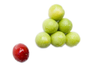 Figure of billiards from fruits of plums and sweet cherries