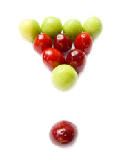 Figure of billiards from fruits of plums and sweet cherries 