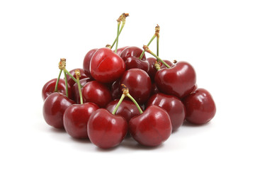 pile of delicious cherries isolated on white