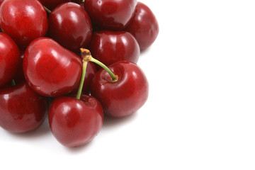 pile of delicious cherries isolated on white
