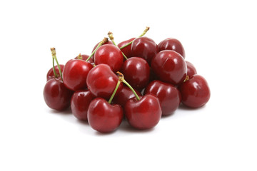 pile of delicious cherries isolated on white