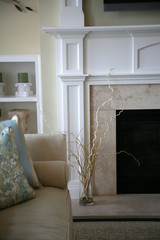Modern fireplace corner in a cozy home, neutral colors