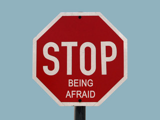 A  stop sign with message added.