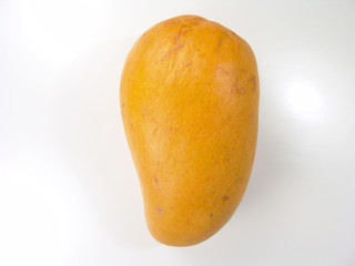 Yellow sweet juicy champagne mango close-up