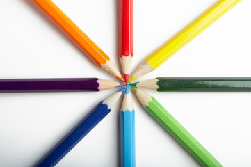 Fototapeta premium A Circle of Colored Pencils on White Background