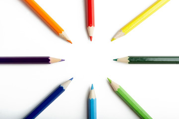A Circle of Colored Pencils on White Background