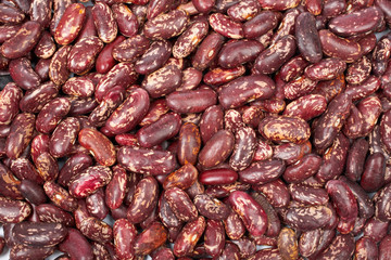 A background of raw beans grouped together