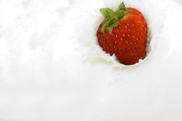 Milk splash with strawberry
