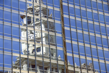 Chicago's Wrigley building reflected in a nearby office tower.