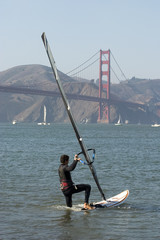 Windsurfer with Golden Gate boarding