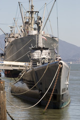 Submarine and War Ship in dock
