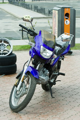 Fototapeta premium Motorcycle with the price list on exhibition.