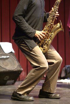 Playing sax during a live jazz session