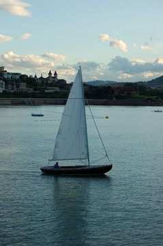 Sailing Boat in Concha Bay. San Sebastian, Spain