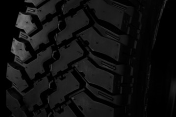 Black automotive tire close-up