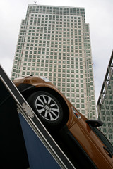 car pointing towards office building