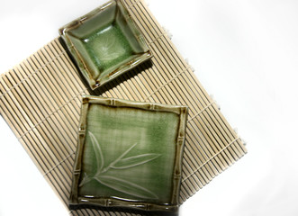 Square sushi plates and bamboo mat