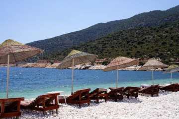 beach umbrellas at the coast of the sea.