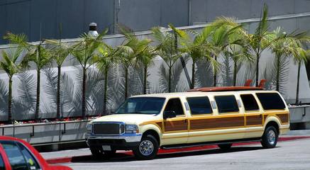 Limousine with surfboards going to the beach in California