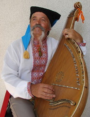 Senior ukrainian musician with bandura 3