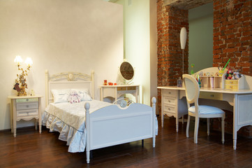 Children's bed and table in a modern bedroom