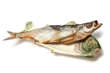 Dry fish on a dish in the form of a fish