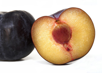 Two Plums - One Cut in half