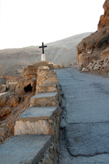 Cross on mountain road to Hozeva orthodox monastery