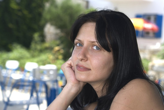 pretty Bulgarian woman at Greek island cafe
